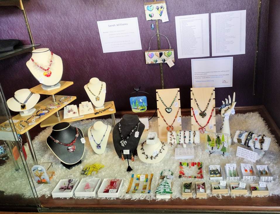 Another view of Sarah's jewelry display at Acoustic Cafe