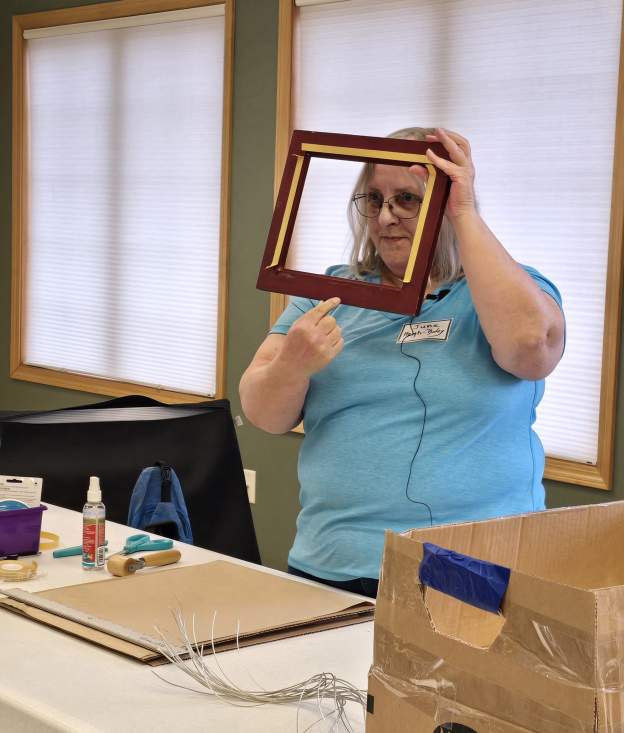 June showing double sided tape on frame for dust cover